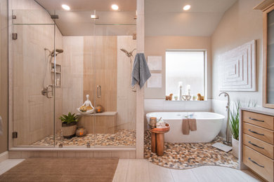 Bathroom - large coastal master beige tile and porcelain tile porcelain tile, beige floor and double-sink bathroom idea in Austin with shaker cabinets, medium tone wood cabinets, beige walls, an undermount sink, quartz countertops, a hinged shower door, beige countertops and a built-in vanity