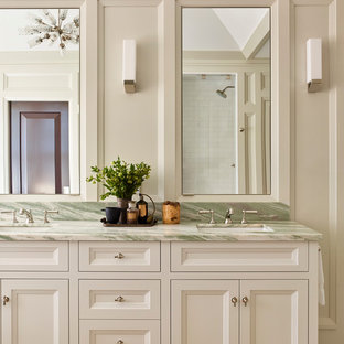Bathroom - large transitional master mosaic tile floor and green floor bathroom idea in Boston with recessed-panel cabinets, beige cabinets, a one-piece toilet, beige walls, an undermount sink, marble countertops and green countertops