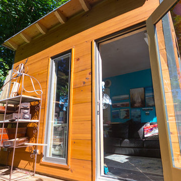 Modern Art Studio Natural 1x12 Pine Siding fully Insulated