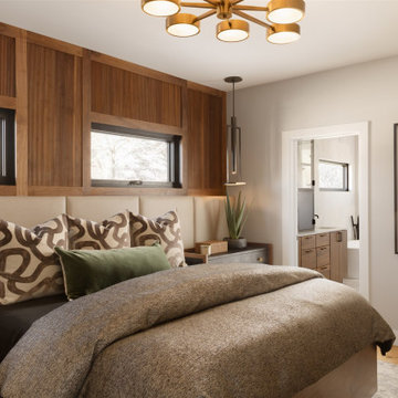 Primary Bedroom with Upholstered Headboard Wall and Wood Wall Detailing