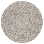 Jaipur Living - Jaipur Living Tenby Solid Gray Round Rug, 6'x6' Round - The understated and sophisticated modern look of the Idriss collection lends balance and versatile style to homes. The braided Tenby area rug is crafted of durable wool and coiled into a chic circular design, perfect for bedrooms, breakfast nooks, and living spaces. Soft heathered gray sets a light and relaxed tone to complement any decor.