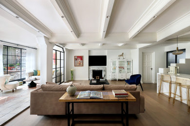Inspiration for an expansive contemporary open plan living room in Other with white walls, medium hardwood flooring, a standard fireplace, a stone fireplace surround, grey floors and a coffered ceiling.