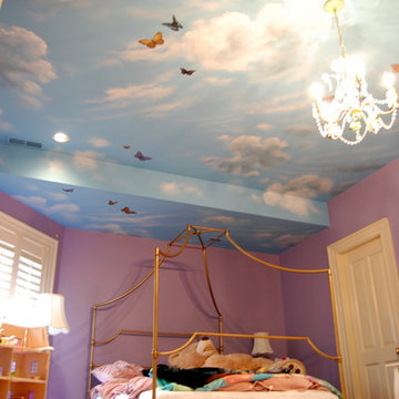 Sky Ceiling Mural with Butterflies, hand-painted in a bedroom by Mural Art LLC.