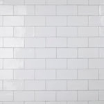 Merola Tile - Chester Bianco Ceramic Wall Tile - Offering a subway look, our Chester Bianco Ceramic Wall Tile features a smooth, glossy finish, providing decorative appeal that adapts to a variety of stylistic contexts. With its semi-vitreous features, this white rectangle tile is an ideal selection for indoor commercial and residential installations, including kitchens, bathrooms, backsplashes, showers, hallways and fireplace facades. This tile is a perfect choice on its own or paired with other products in the Chester Collection. Tile is the better choice for your space!