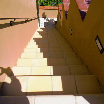 Hillside Room Addition with balcony and steps