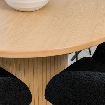 Modern Dining: Round Table & Black Chairs