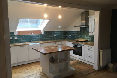 This is an example of a contemporary kitchen in Glasgow.