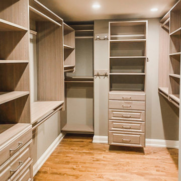 Custom Shelving & Organizing in master closet with drawers and hooks