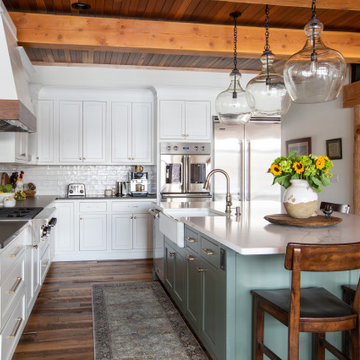 Open Concept Farmhouse Kitchen with Exposed Beams