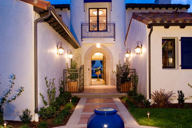 Tuscan home design photo in Orange County