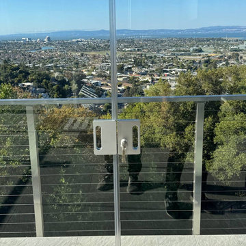 Frameless Sliding Glass Walls for a Panoramic Veranda in California