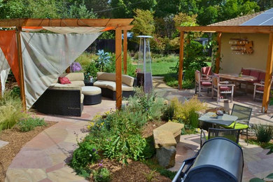 This is an example of a mid-sized craftsman drought-tolerant and full sun backyard stone vegetable garden landscape in San Francisco.