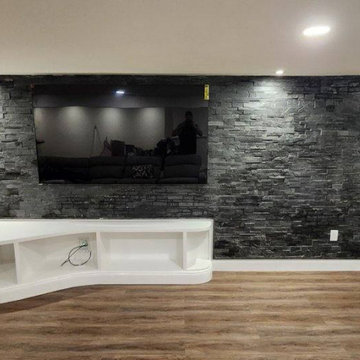 Basement renovation TV room millwork