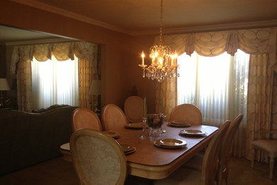 Example of an eclectic dining room design in Detroit