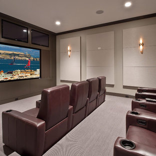 Transitional gray floor home theater photo in Seattle with a projector screen