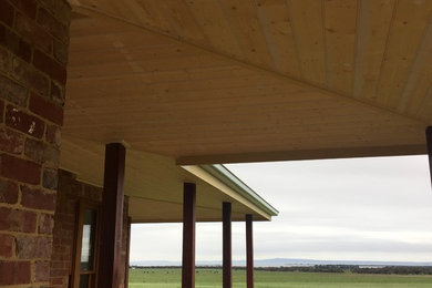Example of a cottage home design design in Geelong