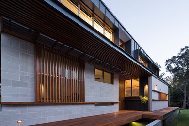 Mid-sized modern two-storey black house exterior in Sydney.