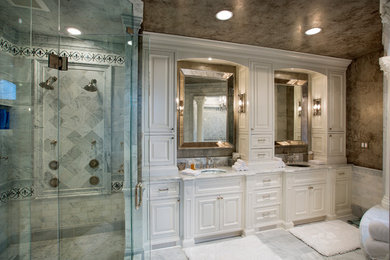 Inspiration for a large timeless master gray tile and stone tile marble floor bathroom remodel in Columbus with an undermount sink, beaded inset cabinets, white cabinets, marble countertops and gray walls