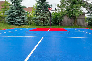 Design ideas for a mid-sized modern full sun backyard concrete paver landscaping in Toronto for summer.