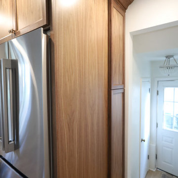Rich & Refined: Custom Walnut Kitchen Remodel with White Quartz & Oak Flooring
