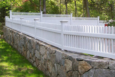 Picket Fence Installation on Stone Fence