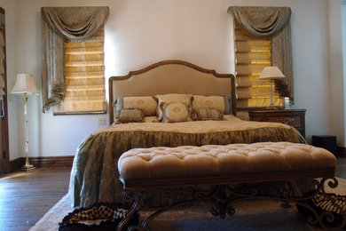 Inspiration for a southwestern master bedroom remodel in Phoenix with beige walls