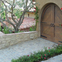 Santa Barbara Sandstone veneer, antique reclaimed cobblestone driveway - Siding And Stone Veneer