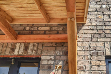 Example of a transitional home design design in Other