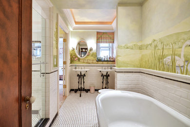 Freestanding bathtub - traditional freestanding bathtub idea in Milwaukee with a pedestal sink