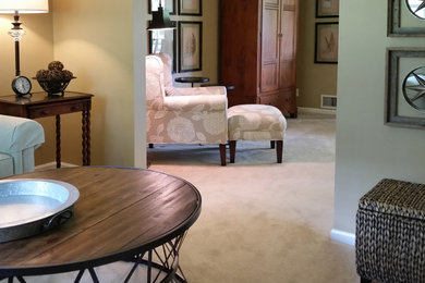 Living room - mid-sized cottage open concept carpeted and beige floor living room idea in Other with beige walls