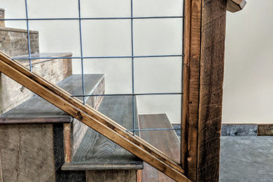 Example of a cottage staircase design in Other