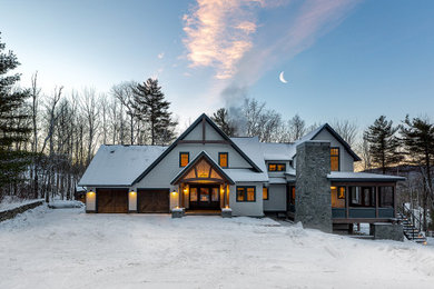 Example of a transitional exterior home design in Burlington