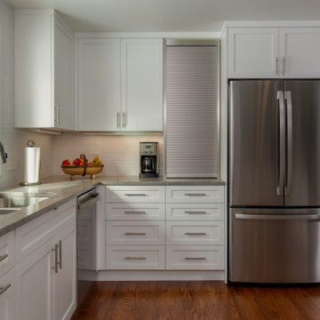 L-shaped kitchen with tambour cabinet for appliance storage