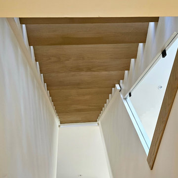 Project #111 | Open-Riser Staircase with Glass Panel Detail