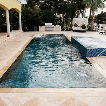 Wet Edge Pool with Custom Tiled Spa and Laminar Deck Jets in Fort Lauderdale Fl.