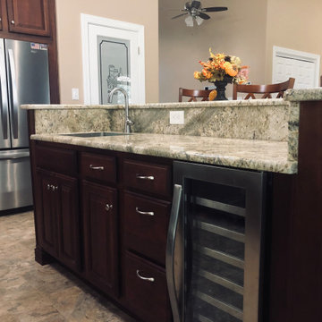 Typhoon Bordeaux Granite with Wellborn Cabinets