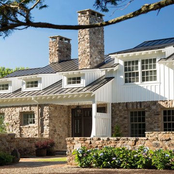 American Farmhouse with Board and Batten and Rustic Stone