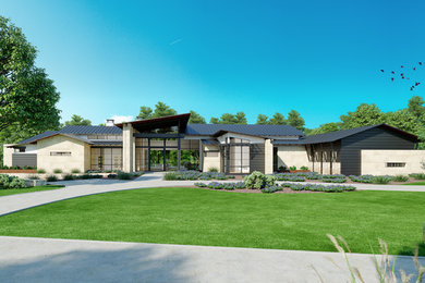 Inspiration for a large 1950s white one-story metal house exterior remodel in Austin with a shed roof and a metal roof