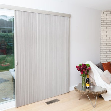 Duette Architella Vertiglide honeycomb shades.