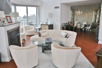 Inspiration for a huge modern formal and open concept dark wood floor and brown floor living room remodel in Chicago with white walls and a standard fireplace