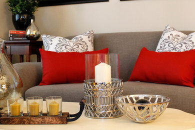 Example of a trendy living room design in DC Metro with gray walls