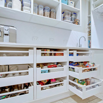Butlers pantry with open cabinets and smart storage options