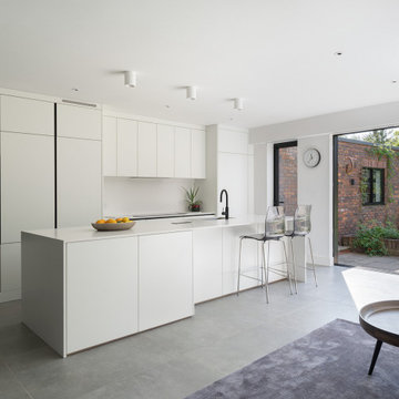 Kitchen with view of converted garage