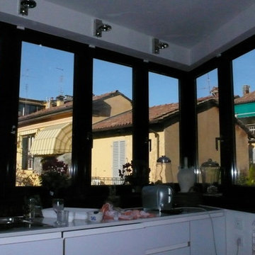 Riqualificazione di edificio bifamiliare