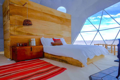 Bedroom - rustic bedroom idea in Other