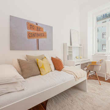Avenida do Chile bedroom with daybed, wall art and writing desk