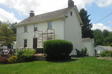 225 year old Delaware Farmhouse Exterior Restoration (stucco and wood trim)