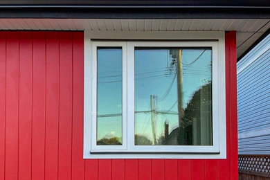 JH Aspyre Collection T&G V-Groove vertical siding in Heritage Red + JH Smooth Tr