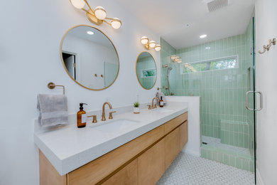 Shower bench - 1950s master green tile porcelain tile, white floor and double-sink shower bench idea in Austin with flat-panel cabinets, light wood cabinets, a bidet, an undermount sink, quartz countertops, white countertops and a floating vanity