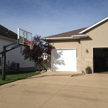 Tim B's Pro Dunk Gold Basketball System on a 30x30 in Marion, IA